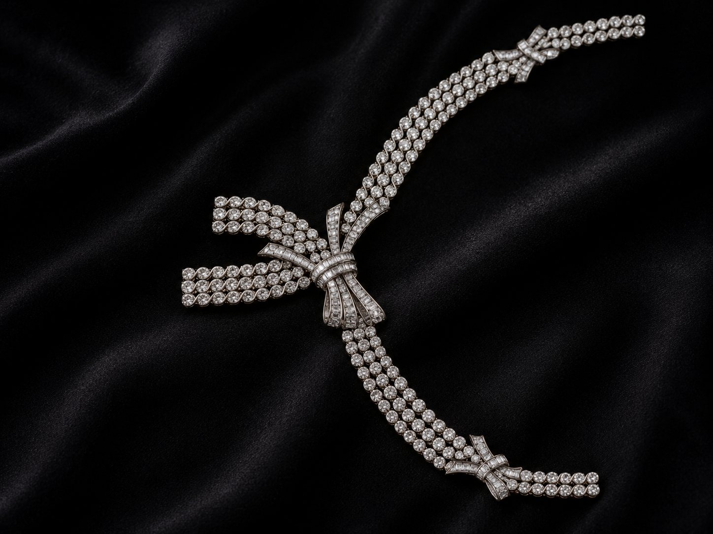 Bow Blossom, triple-row diamond necklace with a baguette bow centre